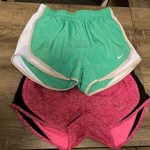 Two pairs of Nike Dri-Fit running shorts. Like new! Perfect for workouts.
